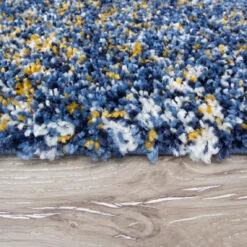 Blue Ochre Mottled Shaggy Rug 14 Blue Ochre Mottled Shaggy Rug -Kukoon Rugs Store Murano Blue Close Up Copy